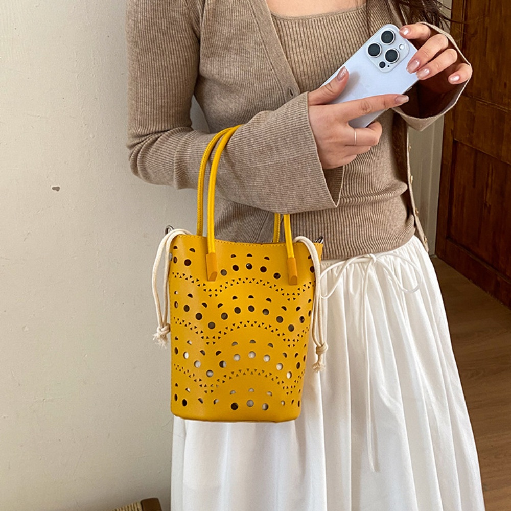 Interior Design Vintage Style - 女性向けニッチデザイン中空デザイン巾着ソフトPUハンドバッグスタイリッシュで絶妙なバケーションスタイルシンプルな通勤用ショルダーバッグ